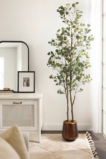 Kate and Laurel 8ft. Eudora Faux Eucalyptus Tree with Round Metal Planter